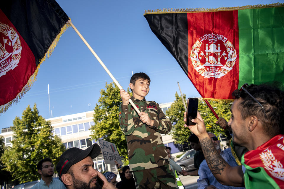 In front of the US Embassy, protesters demonstrate in support of Afghan people, in Copenhagen, Denmark, Sunday Aug. 22, 2021. After the demonstration in front of the Pakistani embassy, the protests continue in front of the US embassy in Copenhagen. (Nils Meilvang / Ritzau Scanpix)