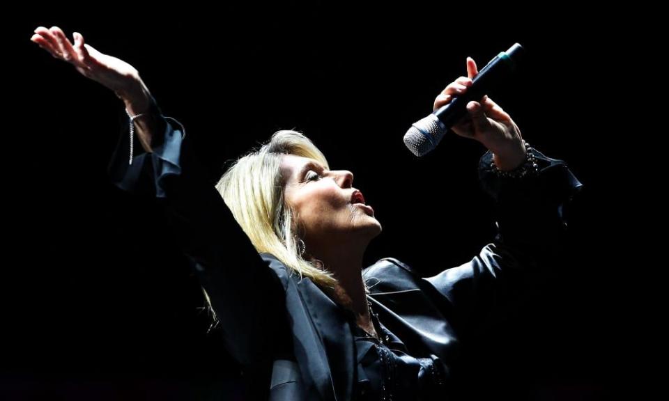 Olivia Newton-John will perform at Cambridge folk festival.