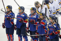 Members of the South Korean women's ice hockey team salute the crowd after an Olympic preparation game against Quinnipiac University in Hamden, Connecticut, U.S., December 28, 2017. Picture taken December 28, 2017. REUTERS/Brian Snyder