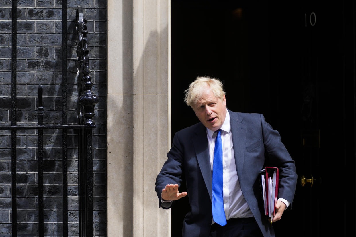 British Prime Minister Boris Johnson leaves 10 Downing Street in London, Wednesday, July 6, 2022. (AP Photo/Frank Augstein)