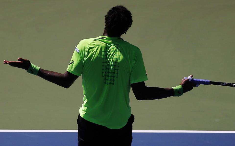 Gael Monfils, of France, reacts after a shot to Alejandro Gonzalez, of Colombia, during the second round of the U.S. Open. (AP Photo/Elise Amendola)