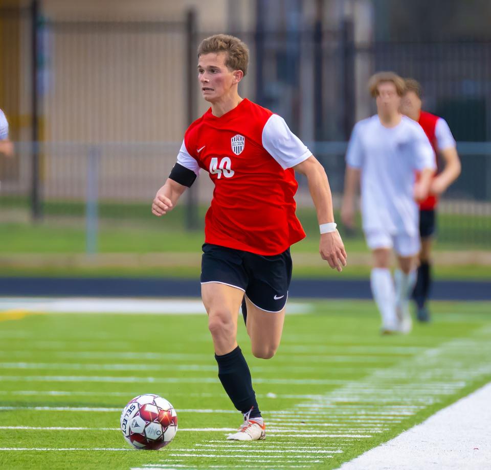 Bowie Bulldogs Jake Ciccarello (40) dribbles the ball against the Westlake Chaparrals during the first half at the District 26-6A boys soccer game on Friday, Feb 2, 2024, at Toney Burger Stadium in Austin, TX.