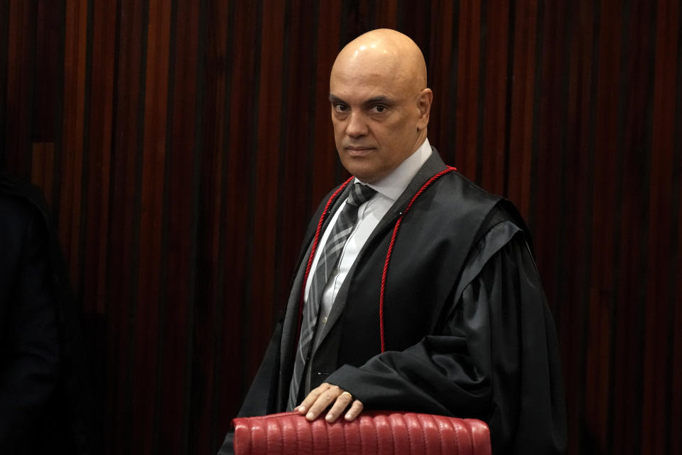 FILE - Brazilian Supreme Court Chief Justice Alexandre de Moraes arrives for a court hearing, in Brasilia, Brazil, June 22, 2023. (AP Photo/Eraldo Peres, File)