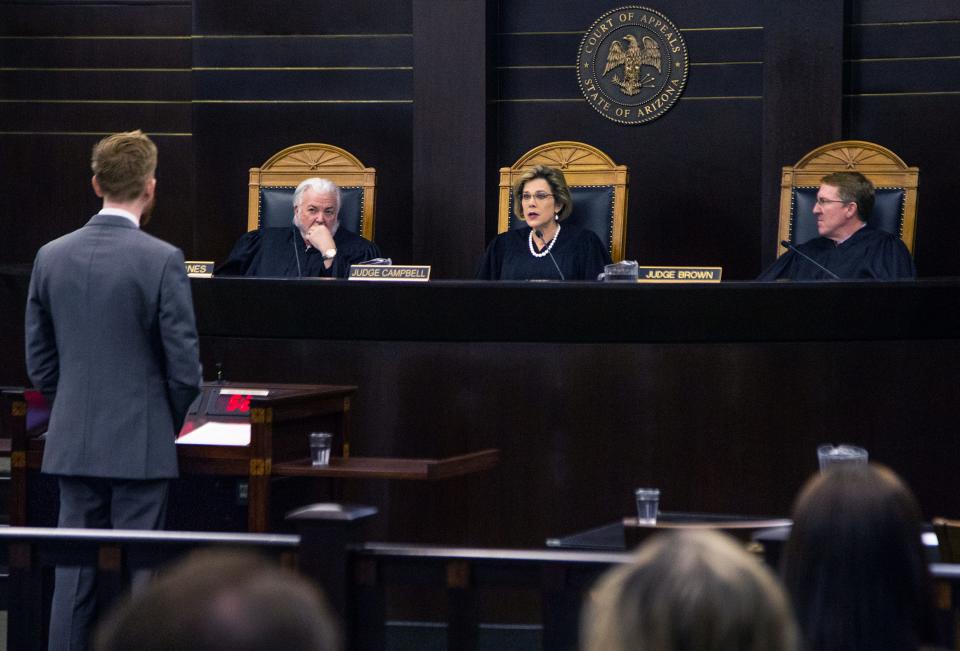 Assistant Attorney General Terry M. Crist (left) delivers an oral argument that prosecutorial misconduct should not overturn the conviction in the Jodi Arias murder trial.  Arizona Court of Appeals judges Kenton Jones (left)  Jennifer B. Campbell and Michael Brown listen in Phoenix on Thursday, Oct. 17, 2019.