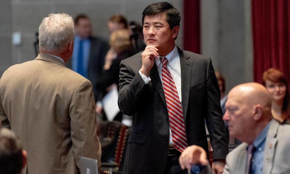 House Majority Leader Jon Patterson, R-Lee’s Summit, speaks with a colleague on Tuesday, March 7, 2023, at the state Capitol in Jefferson City, Mo.