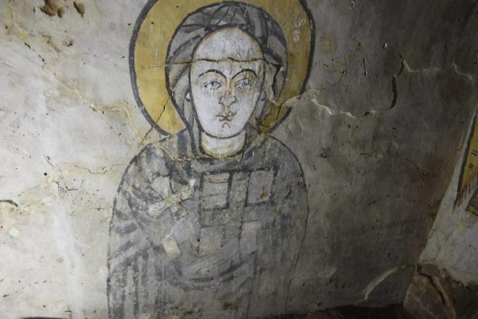 Painting of the Virgin Mary on the side wall of the chamber.