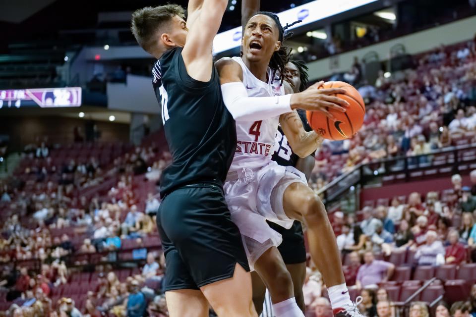 Florida State guard Caleb Mills (4) attempts to get by Stetson's Josh Smith on Monday, Nov. 7, 2022 at Donald L Tucker Civic Center.