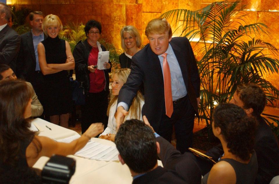 Donald Trump greets ‘The Apprentice’ candidates in 2004 (AP)