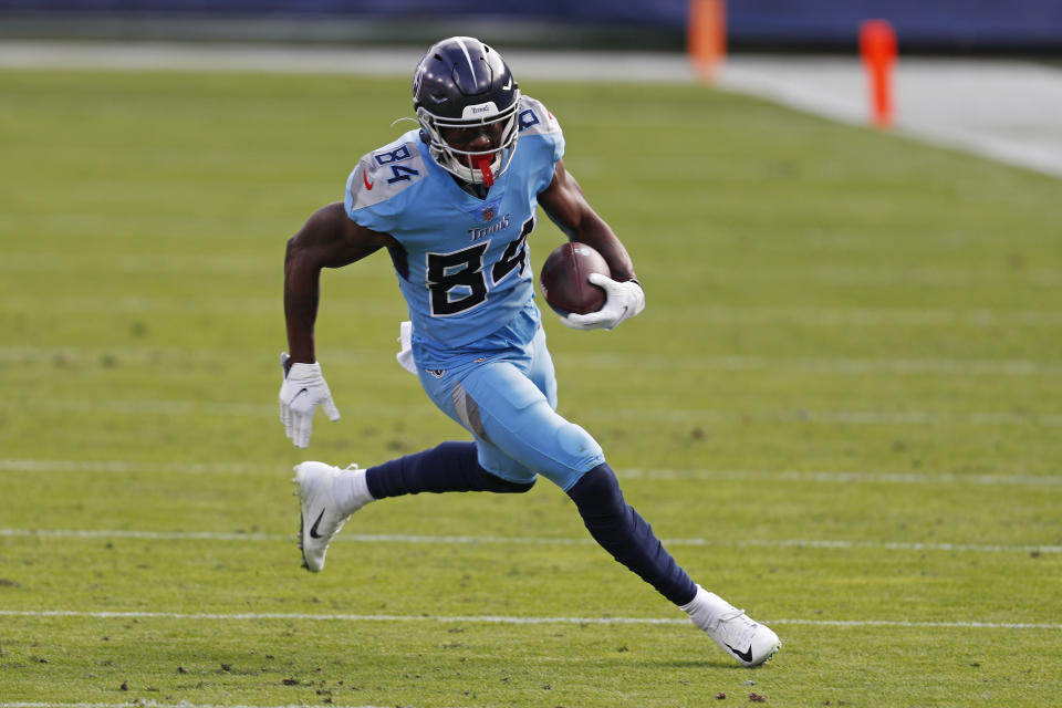 Tennessee Titans wide receiver Corey Davis (84) carries the ball against the Cleveland Browns in the second half of an NFL football game Sunday, Dec. 6, 2020, in Nashville, Tenn. (AP Photo/Wade Payne)