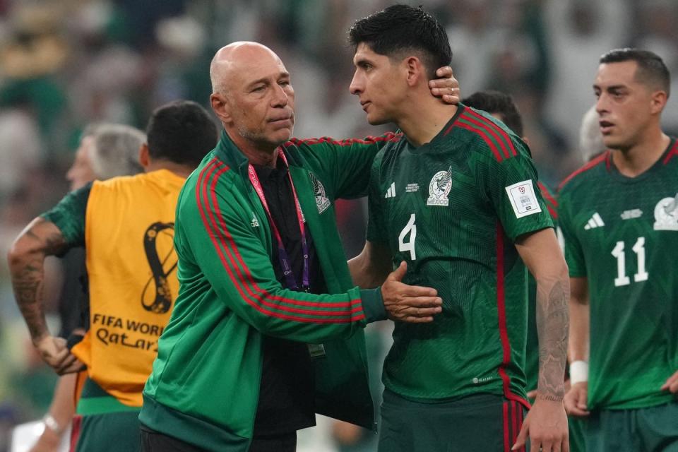 Edson Alvarez (right) is consoled after Mexico beat Saudi Arabia but missed out on a place in the last 16 (Nick Potts/PA) (PA Wire)