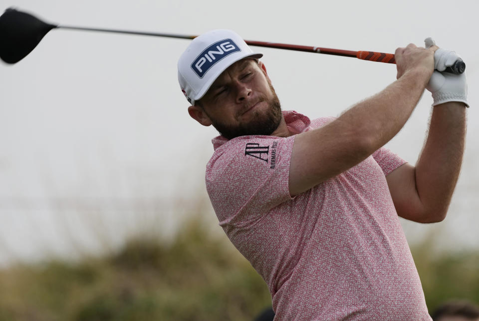 England's Tyrrell Hatton tees off on the 11th hole during the first round of the Abu Dhabi Championship golf tournament at the Yas Links Golf Course in Abu Dhabi, United Arab Emirates, Thursday, Jan. 20, 2022. (AP Photo/Kamran Jebreili)