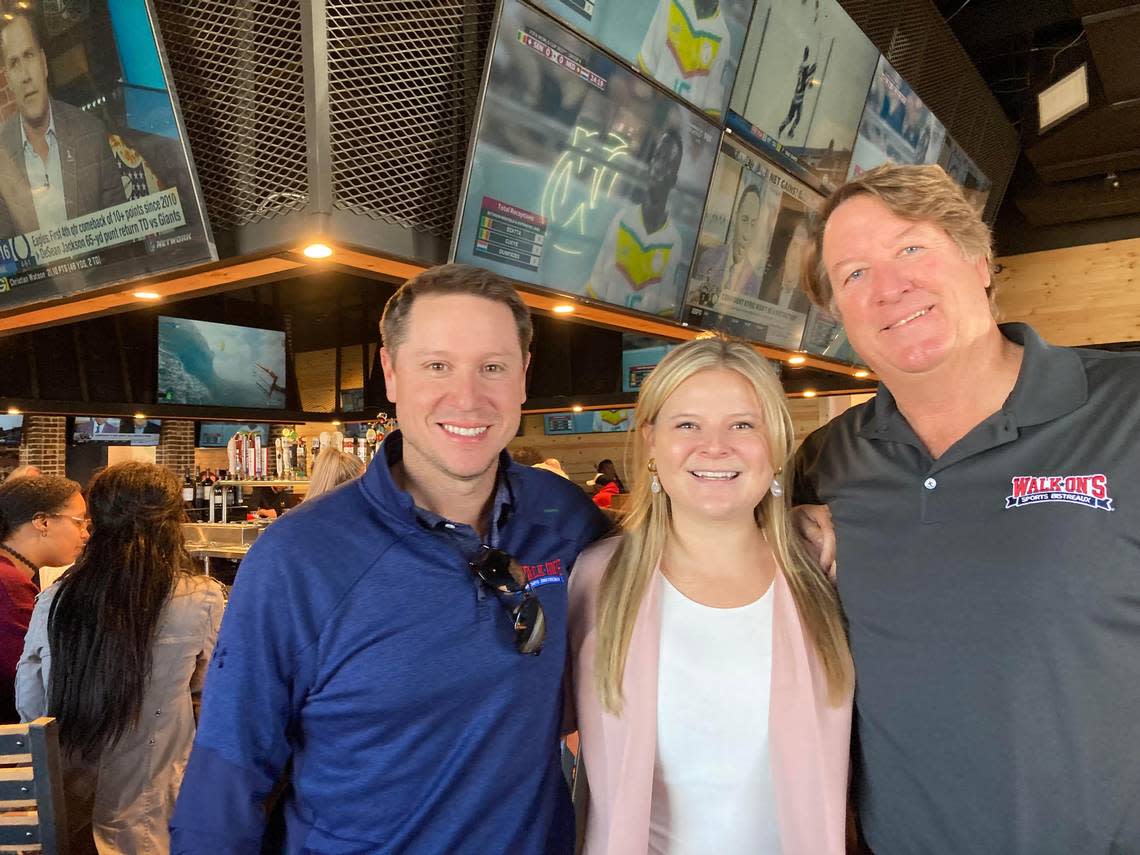 From Left, Walk-On’s Sports Bistreaux founder Brandon Landry, Gracie Preston Rigby of Gracie’s: a Rooftop Bar, and Walk-On’s franchisee Steve Rigby, owner of Rigby’s Water World/Rigby’s Entertainment Complex. Gracie is Steve’s eldest daughter.