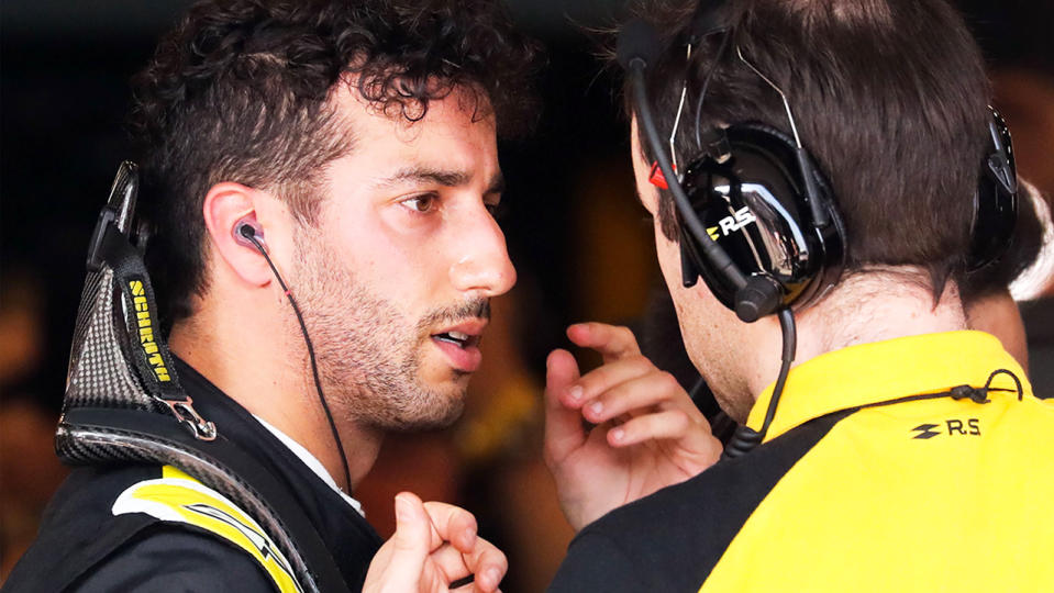 Daniel Ricciardo after his withdrawal. (Photo by ASANKA BRENDON RATNAYAKE/AFP/Getty Images)