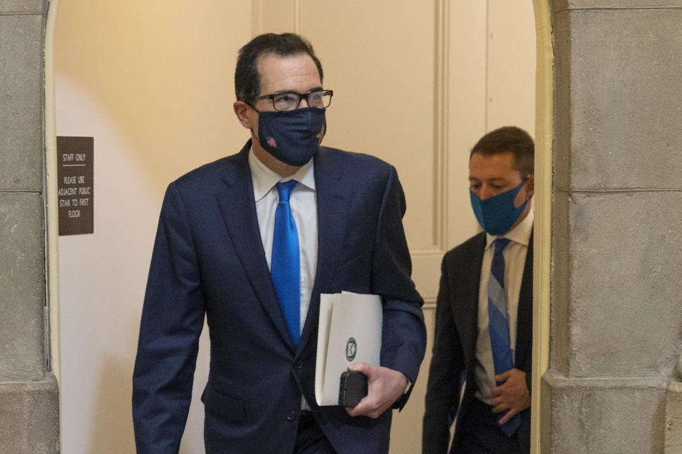 Treasury Secretary Steven Mnuchin, arrives for a meeting with House Speaker Nancy Pelosi of Calif., at the Speaker's office on Capitol Hill, Wednesday, Sept. 30, 2020, in Washington. (AP Photo/Manuel Balce Ceneta)