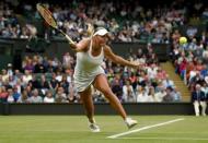 Britain Tennis - Wimbledon - All England Lawn Tennis & Croquet Club, Wimbledon, England - 29/6/16 Ukraine's Kateryna Kozlova in action against Poland's Agnieszka Radwanska REUTERS/Tony O'Brien