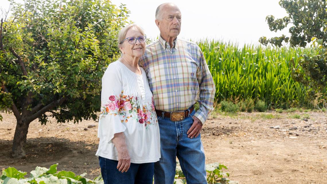 Steve Beus, right, with his wife, Becky. Steve and his brother, Shane Beus, aim to sell their family’s farmland to Savion, a solar farm developer. Steve framed the sale as an issue of property rights. In Steve’s words: “We’ve been working this sucker for 70 years. I think I’ve earned the right to sell it and quit.”