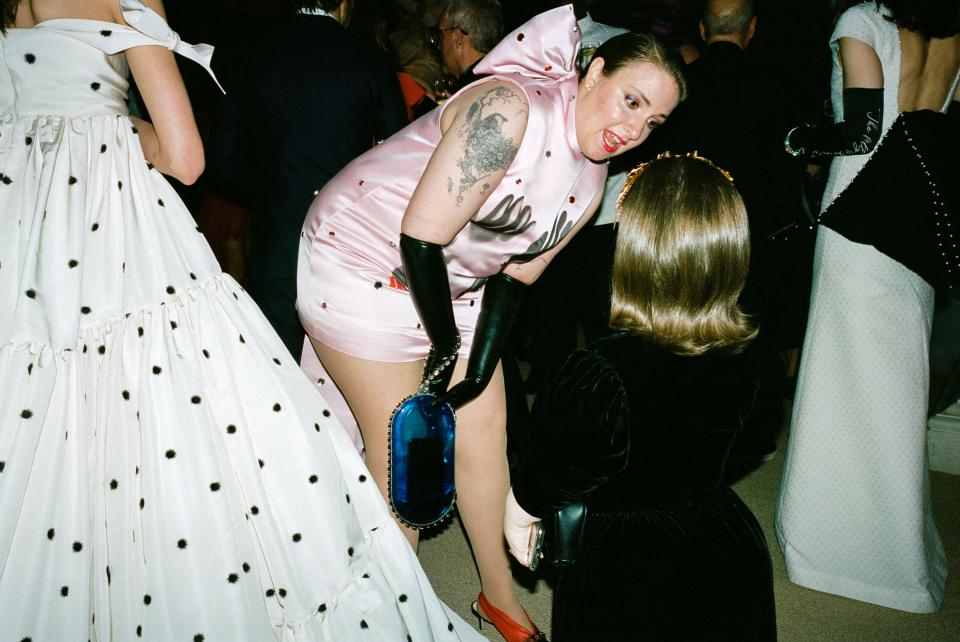 2019 - Lena Dunham and Sinead Burke get acquainted during the cocktail hour.