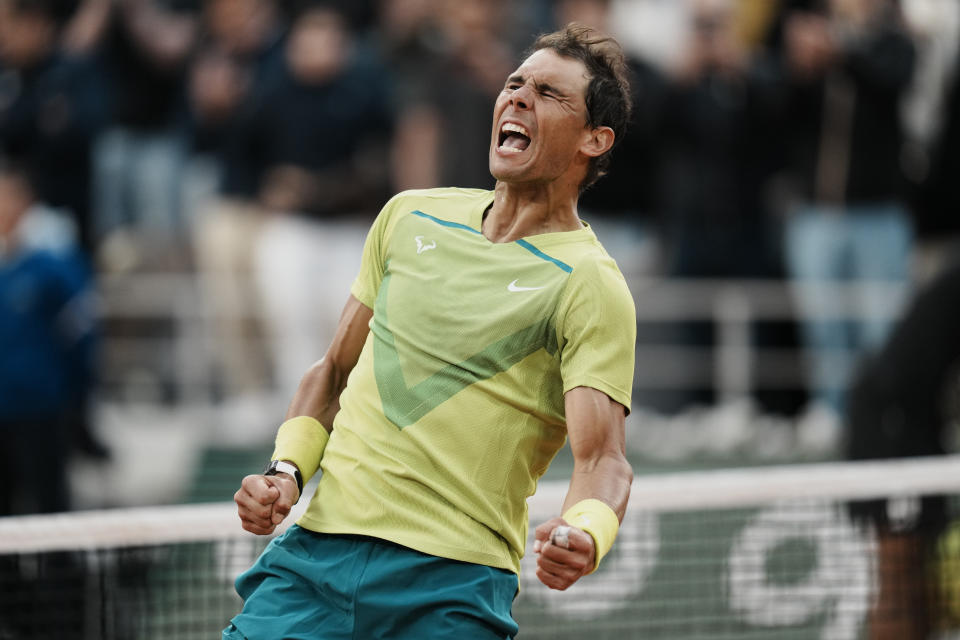 Spain's Rafael Nadal celebrates winning against Canada's Felix Auger-Aliassime in 5 sets, 3-6, 6-3, 6-2, 3-6, 6-3, during their fourth round match at the French Open tennis tournament in Roland Garros stadium in Paris, France, Sunday, May 29, 2022. (AP Photo/Thibault Camus)