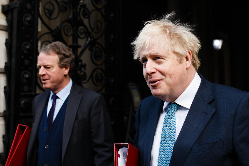 British prime minister Boris Johnson and secretary of state for Scotland Alister Jack, left, return to Downing Street from the weekly cabinet meeting on 15 December. Photo: David Cliff/NurPhoto via Getty Images