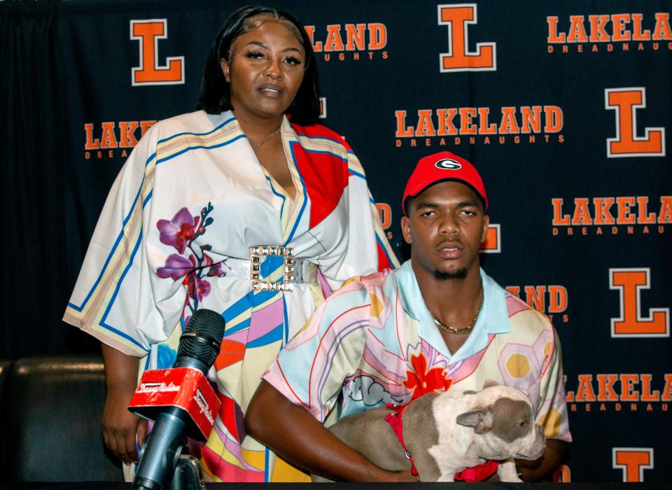 Lakeland senior wide receiver Tyler Williams poses with his mother Shanteria Williams after he committed to Georgia on Tuesday night at The Well in Lakeland.