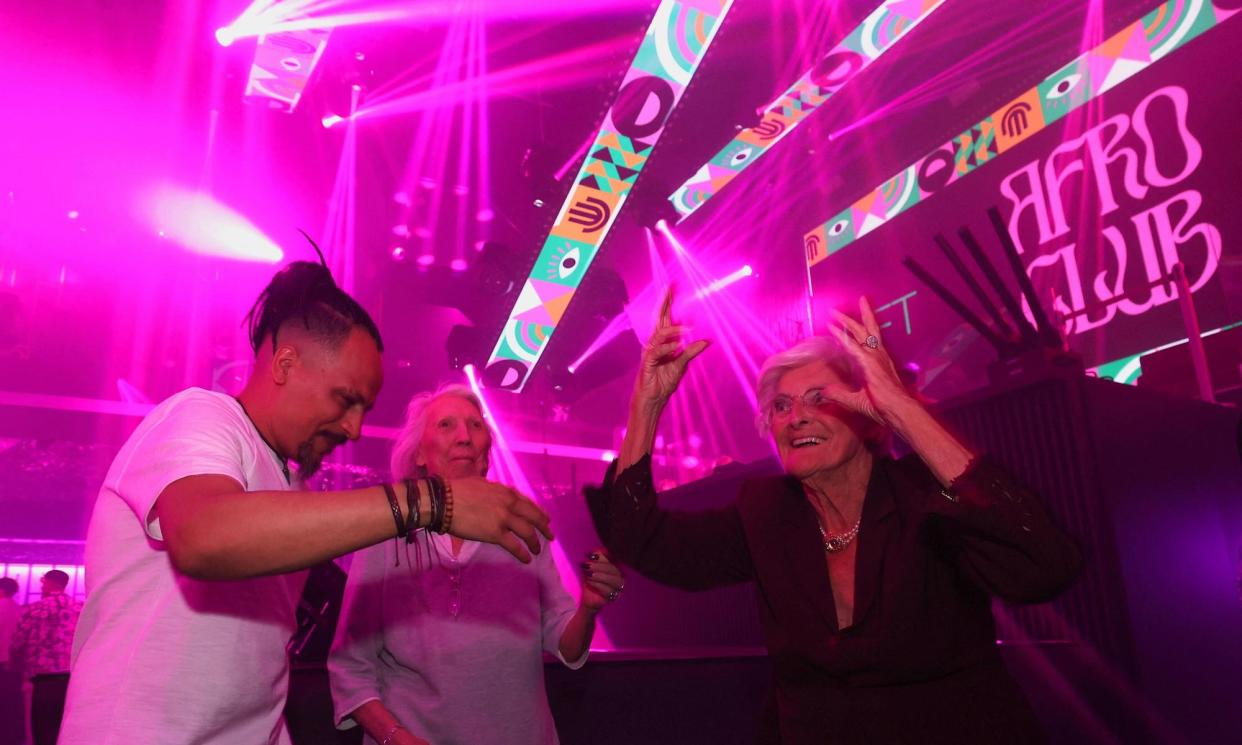 <span>Nicole Walraet and Martha Beckers dance at the Lift Brussels nightclub.</span><span>Photograph: Yves Herman/Reuters</span>