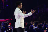 Host Trevor Noah speaks at the 65th annual Grammy Awards on Sunday, Feb. 5, 2023, in Los Angeles. (AP Photo/Chris Pizzello)