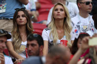 <p>Matthias Ginter of Germany’s wife, Christina Ginter, and Marco Reus of Germany’s girlfriend Scarlett Gartmann look on during the 2018 FIFA World Cup Russia group F match between Korea Republic and Germany at Kazan Arena on June 27, 2018 in Kazan, Russia. (Photo by Lars Baron – FIFA/FIFA via Getty Images) </p>