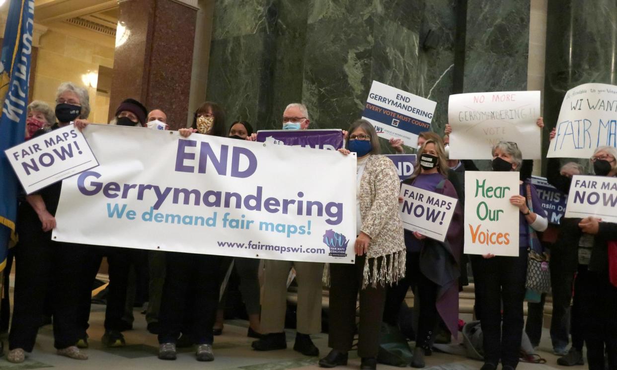 <span>More than 100 opponents of the Republican redistricting plans vow to fight the maps at a rally ahead of a joint legislative committee hearing at the Wisconsin state capitol in Madison, Wisconsin, Oct. 28, 2021. </span><span>Photograph: Scott Bauer/AP</span>