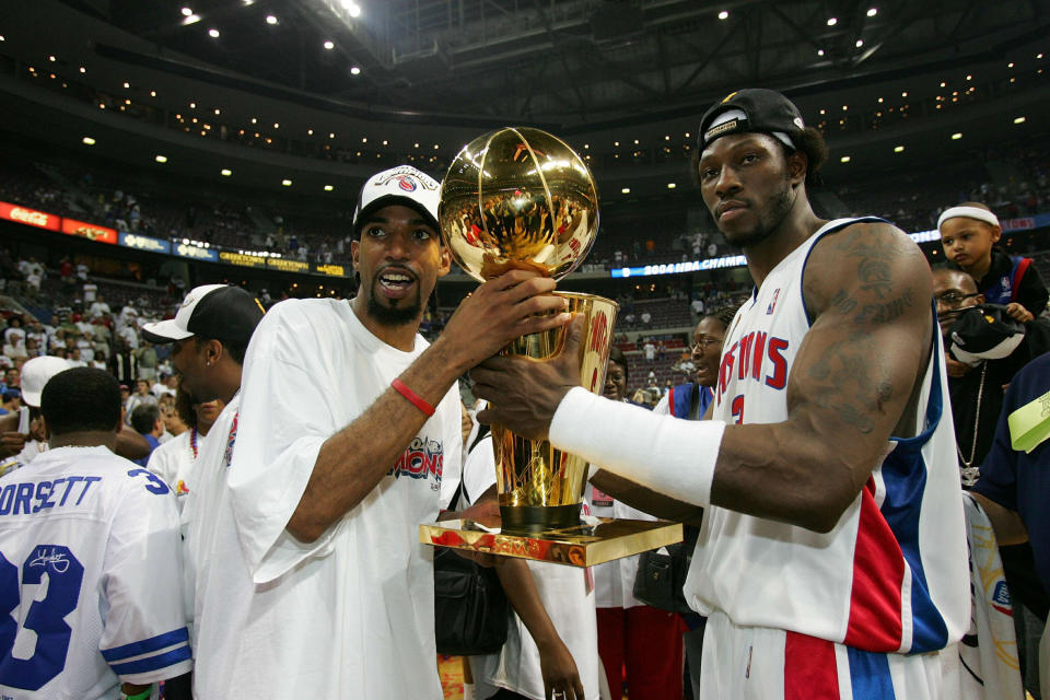 Richard Hamilton and Ben Wallace celebrate their title victory. (Getty Images)