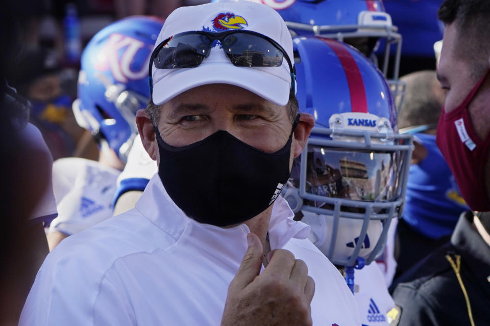 FILE - Kansas head coach Les Miles is shown before an NCAA college football game against Oklahoma in Norman, Okla., in this Saturday, Nov. 7, 2020, file photo. LSU's former athletic director recommended in 2013 that Les Miles be fired as Tigers football coach because of his behavior with female student workers. Then-Athletic Director Joe Alleva's recommendation to former LSU President F. King Alexander is detailed in a newly released report into how the university handled sexual misconduct complaints. The report was released Friday, March 5, 2021, by the Husch Blackwell law firm. (AP Photo/Sue Ogrocki)