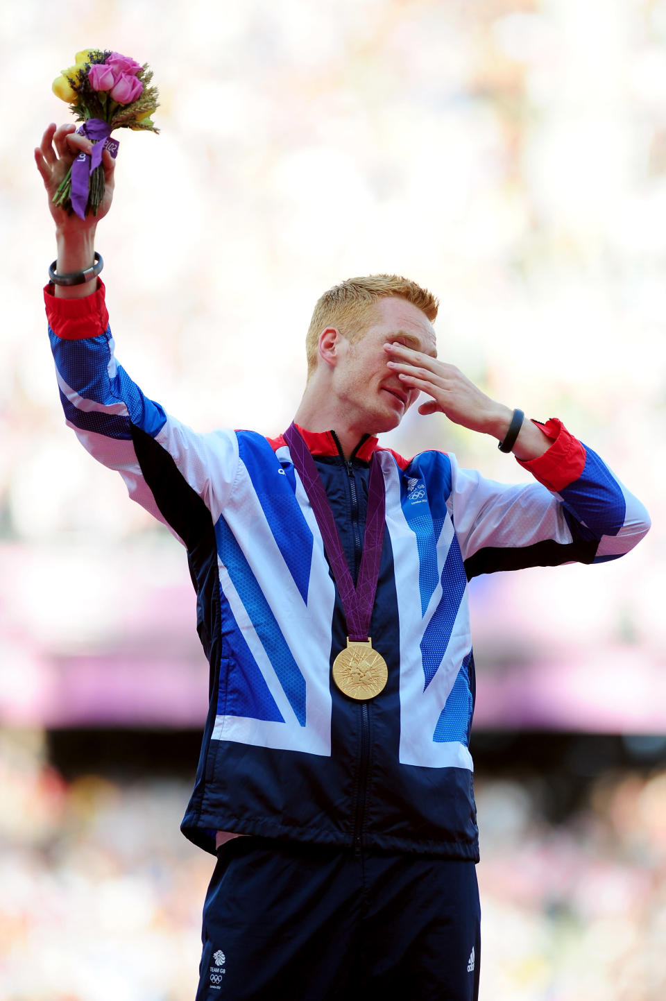 LONDON, ENGLAND - AUGUST 05: Gold medalist Greg Rutherford of Great Britain pose on the podium for Men's Long Jump on Day 9 of the London 2012 Olympic Games at the Olympic Stadium on August 5, 2012 in London, England. (Photo by Mike Hewitt/Getty Images)