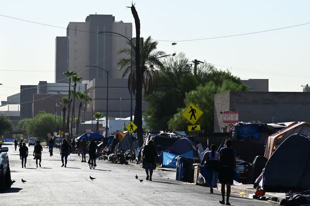 People walk in the street in 