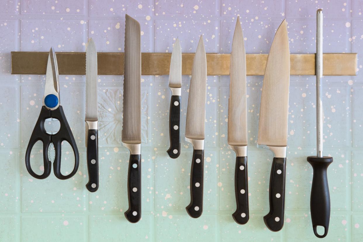 kitchen knives on a designed background