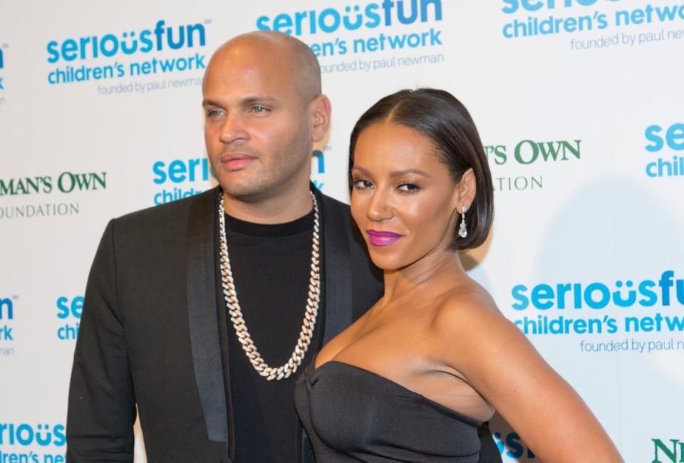 The Spice Girl, pictured with her former husband Stephen Belafonte, has claimed their 10-year marriage was abusive, which he vehemently denies (PA Archive)