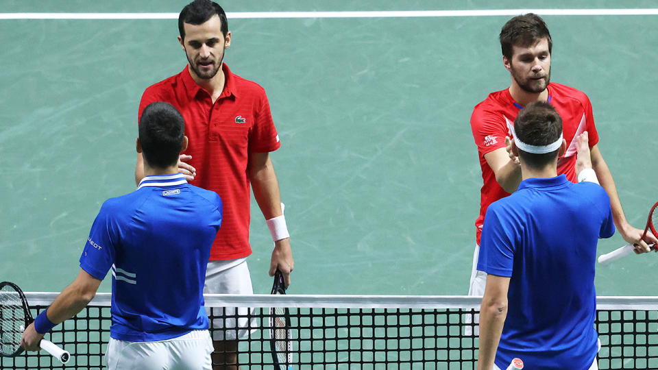 Novak Djokovic and Filip Krajinovic, pictured here congratulating Nikola Mektic and Mate Pavic after the Davis Cup semi-final.