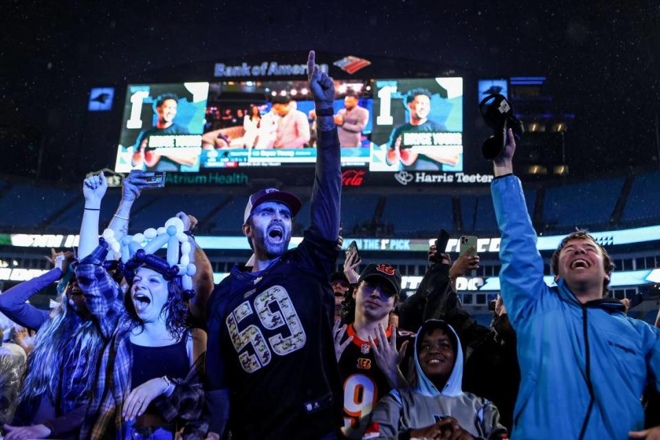 Fans react as the Panthers pick quarterback Bryce Young as the number one pick during in the NFL Draft during a fan watch party at Bank of America Stadium on Thursday, April 27, 2023.