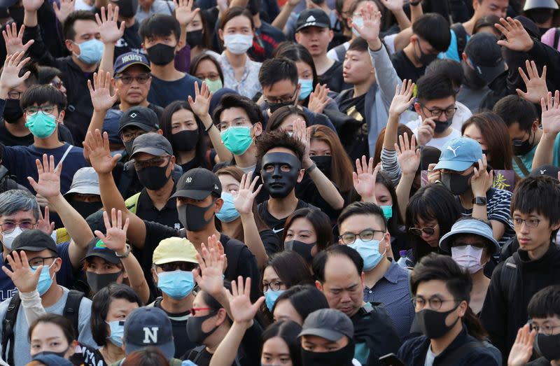 Anti-government protesters attend the "Lest We Forget" rally in Hong Kong