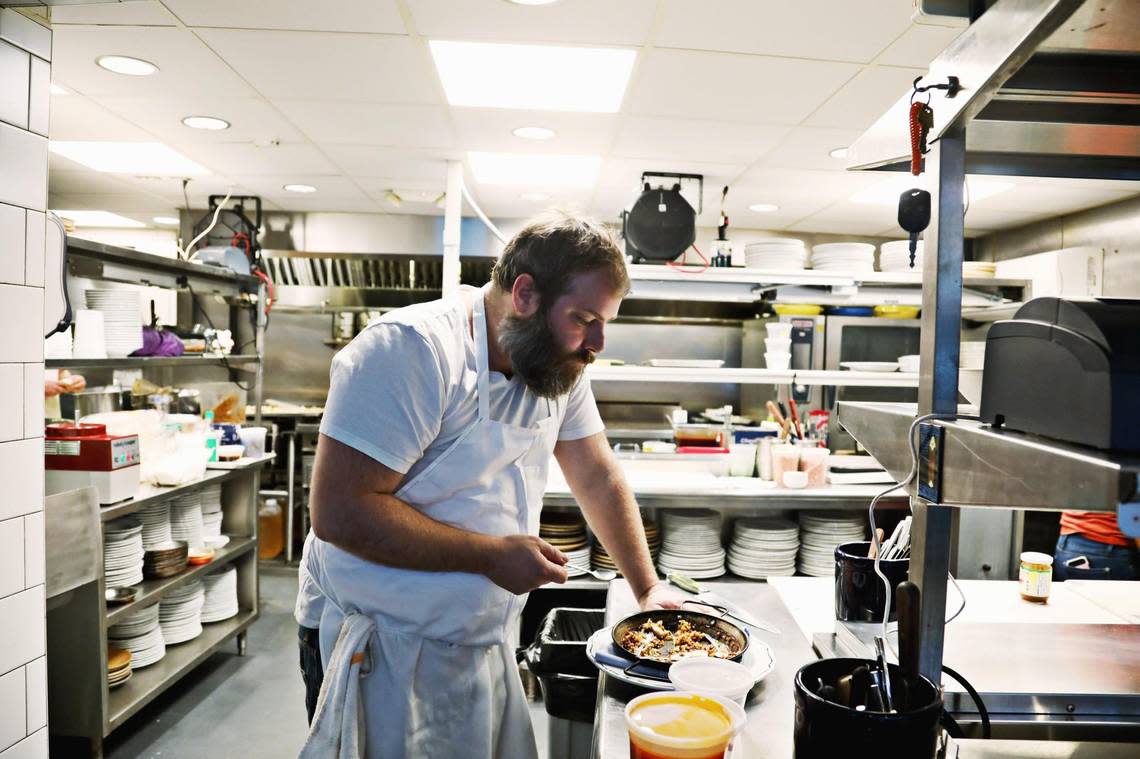 Durham chef Matt Kelly, pictured here in the kitchen of the now-closed Saint James Seafood, has purchased Nana’s from chef Scott Howell.