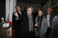 Parti Quebecois leader Pauline Marois (C) arrives at a campaign stop in Montreal, Quebec, March 14, 2014. Quebec voters will go to the polls in a provincial election on April 7. REUTERS/Christinne Muschi (CANADA - Tags: POLITICS)