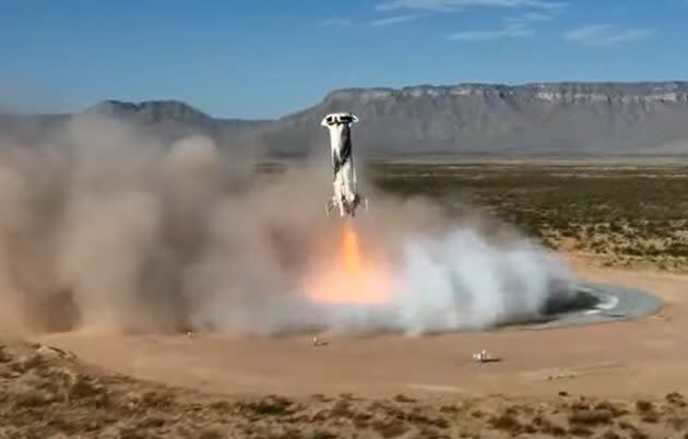 New Shepard’s booster makes an autonomous landing. (Blue Origin via YouTube)