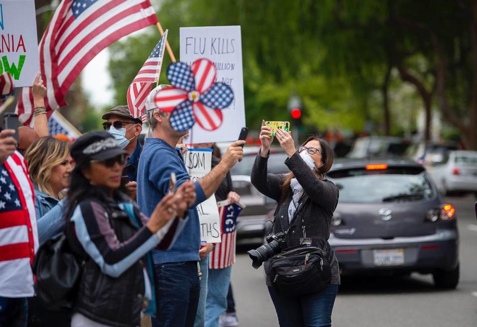 Sacramento Bee visual journalist Renée C. Byer captures video of demonstrators who converged on the state Capitol in Sacramento on Monday, April 20, 2020, to protest against the state’s stay-at-home orders to slow the spread of the coronavirus.