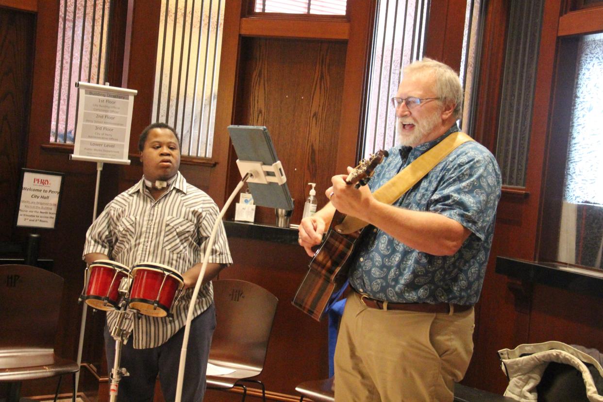 Sean and Steve Parnell perform inside the Security Bank Building during the 2021 Art on the Prairie. The pair will perform during Perry Fine Art's annual variety show on Tuesday, July 4, 2023.