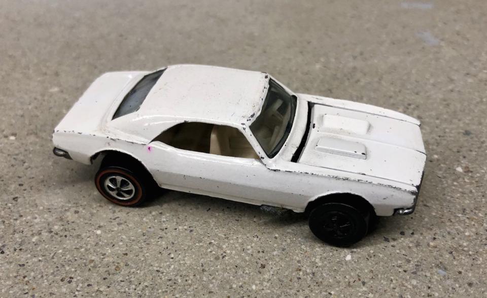<p>Reportedly the first Hot Wheels car to make the transition from the drawing board to production, the Enamel White Camaro was intended as a prototype for designers to use as a muse. Some of them were mistakenly packaged and sent to stores, however, making each one another rare find. </p>