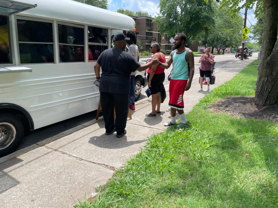 BattleField Farm & Gardens founder Chris Battle greets East Knoxville residents who are eager for fresh produce. “Y’all enjoy!” he says. July 13, 2022