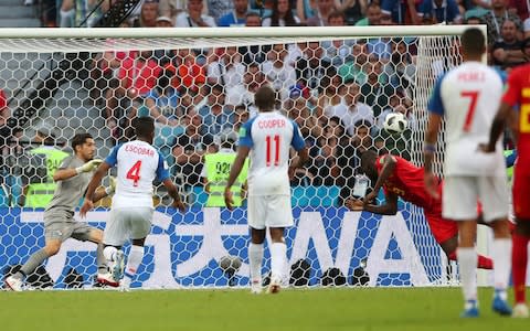 Romelu Lukaku scores his first and Belgium's second - Credit: REUTERS/Hannah McKay