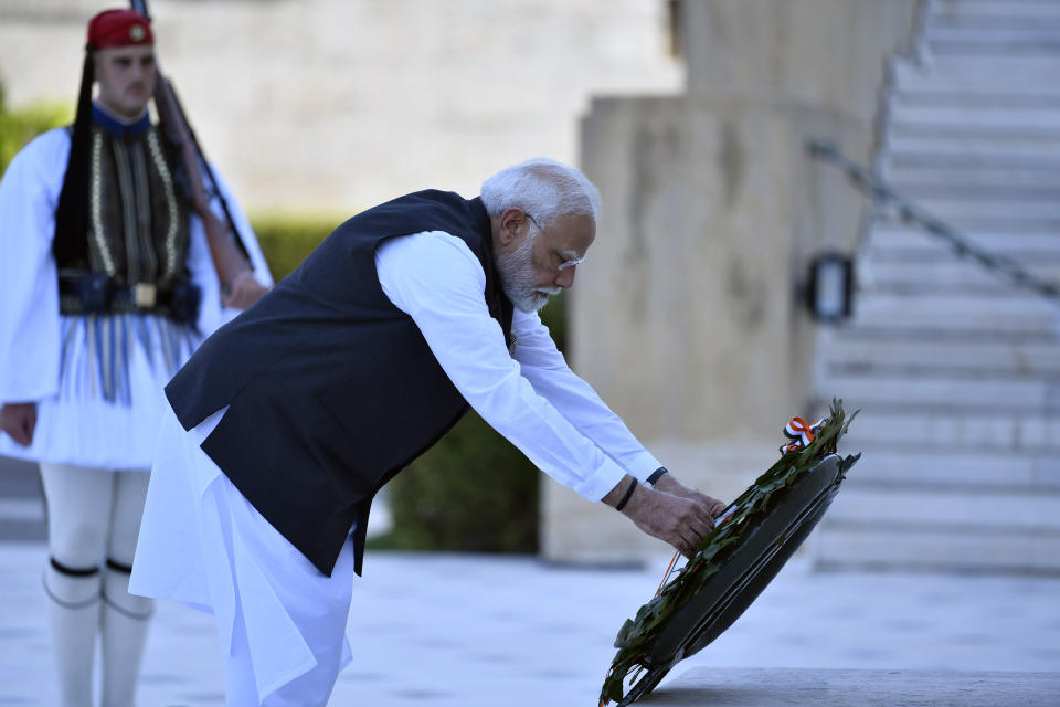 Indian Prime Minister Narendra Modi lays a wreath at the Tomb of the Unknown Soldier in Athens, Greece, Friday, Aug. 25, 2023. Modi's visit to Athens is especially significant for Greek foreign policy as it is the first official visit by an Indian prime minister to Greece in 40 years. (AP Photo/Michael Varaklas)