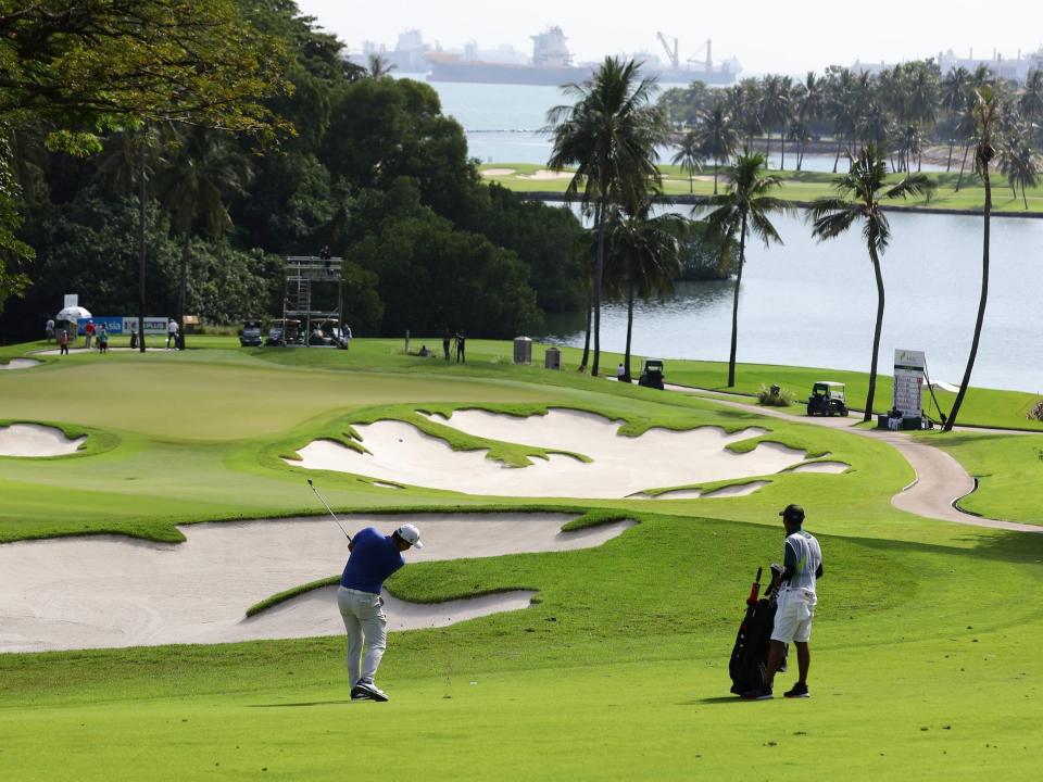 Sihwan Kim of United States in action during The Open Qualifying Series, part of the SMBC Singapore Open at Sentosa Golf Club, Serapong Course on January 23, 2022 in Singapore, Singapore.