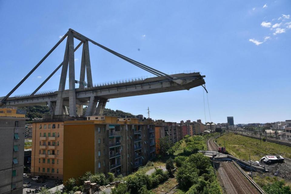 A view of the collapsed Morandi bridge the day after the disaster in Genoa (EPA)