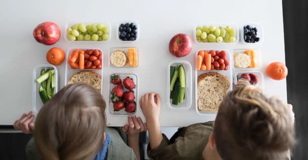 PHOTO: In this undated stock photo, an overhead view of a brother and sister eating healthy snacks and lunches. (STOCK PHOTO/Getty Images)