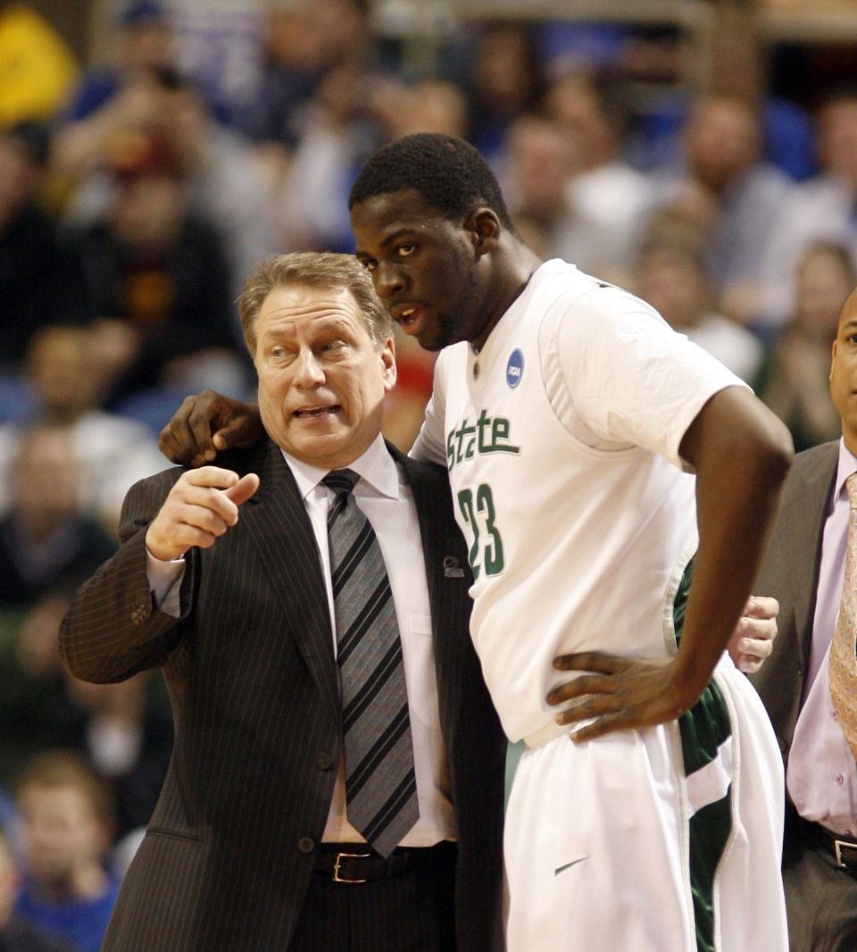 Michigan State University head coach Tom Izzo talks with Draymond Green during a break against USC  in the 1st half of their 2nd round game of the NCAA basketball tournament in Minneapolis, Minn. on Sunday, March 22, 2009.